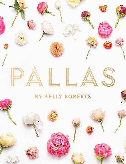 A floral-pattern book cover featuring pastel roses scattered around the title &ldquo;Pallas&rdquo; by Kelly Roberts, with a white background.